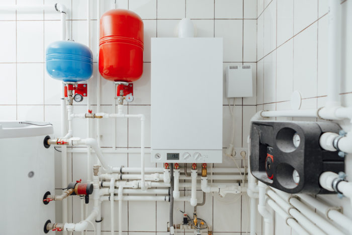 A system boiler with an unvented hot water cylinder and expansion vessels